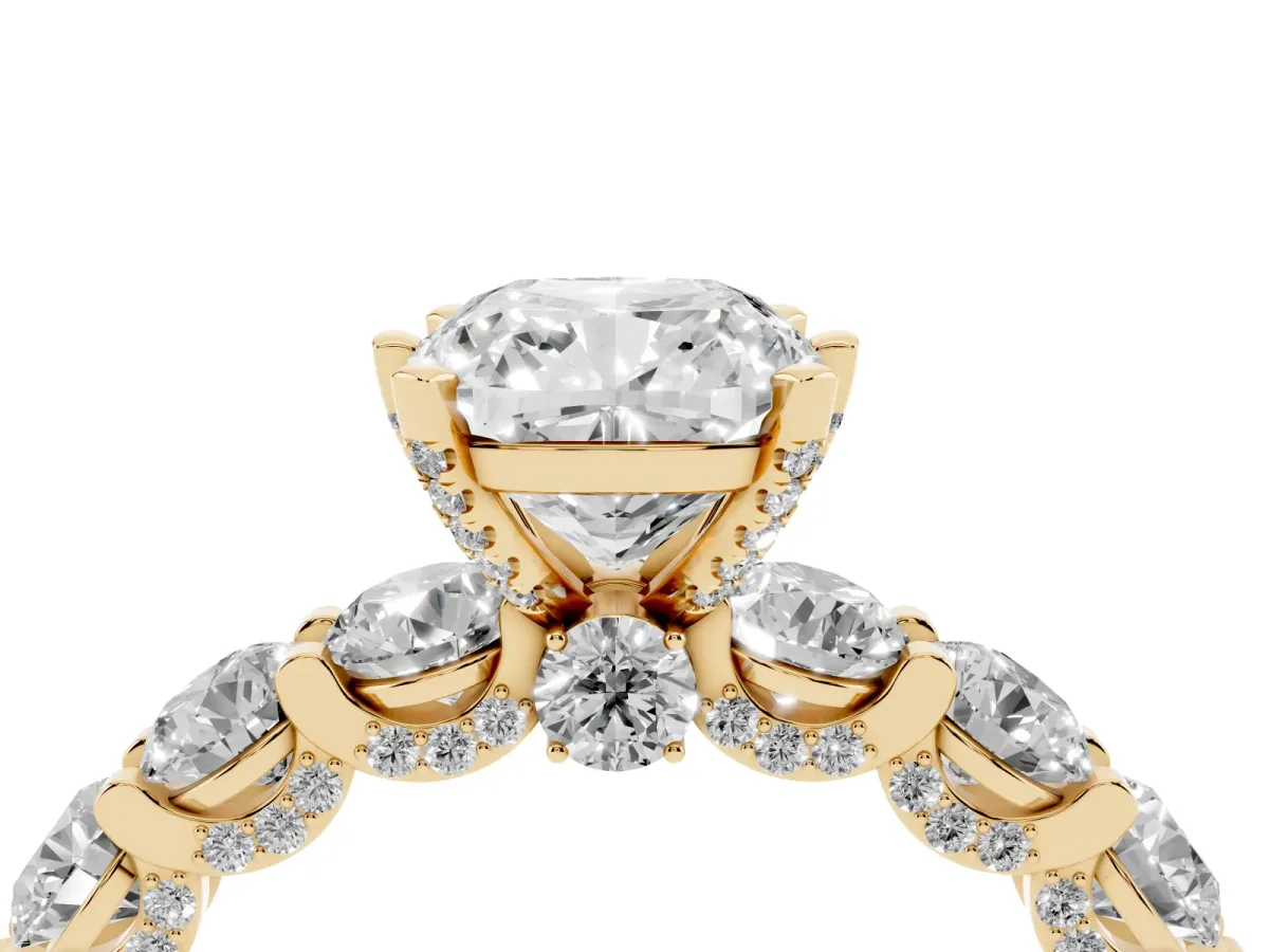 Cushion Cut Diamond Side Stone Engagement Ring with Four-Prong Setting Yellow gold