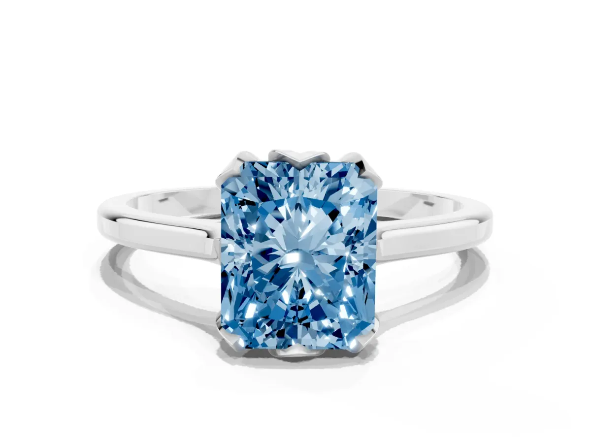 Fancy Blue Radiant Cut Diamond Solitaire Ring with Flower Prong Setting and Classic Band Silver