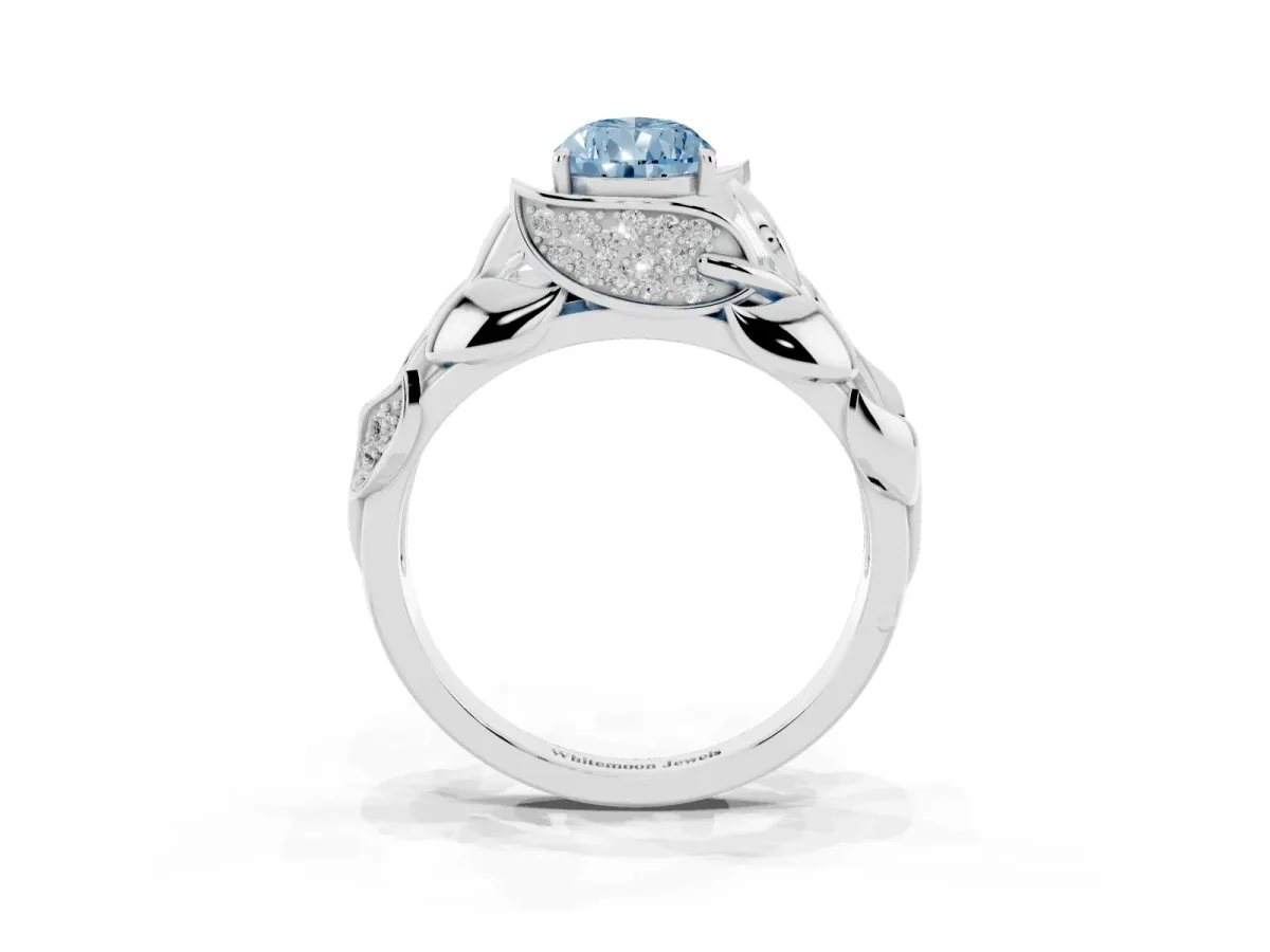 Fancy Blue Pear Cut Diamond Leaf-Inspired Engagement Ring with Round Accents and Prong Setting Silver