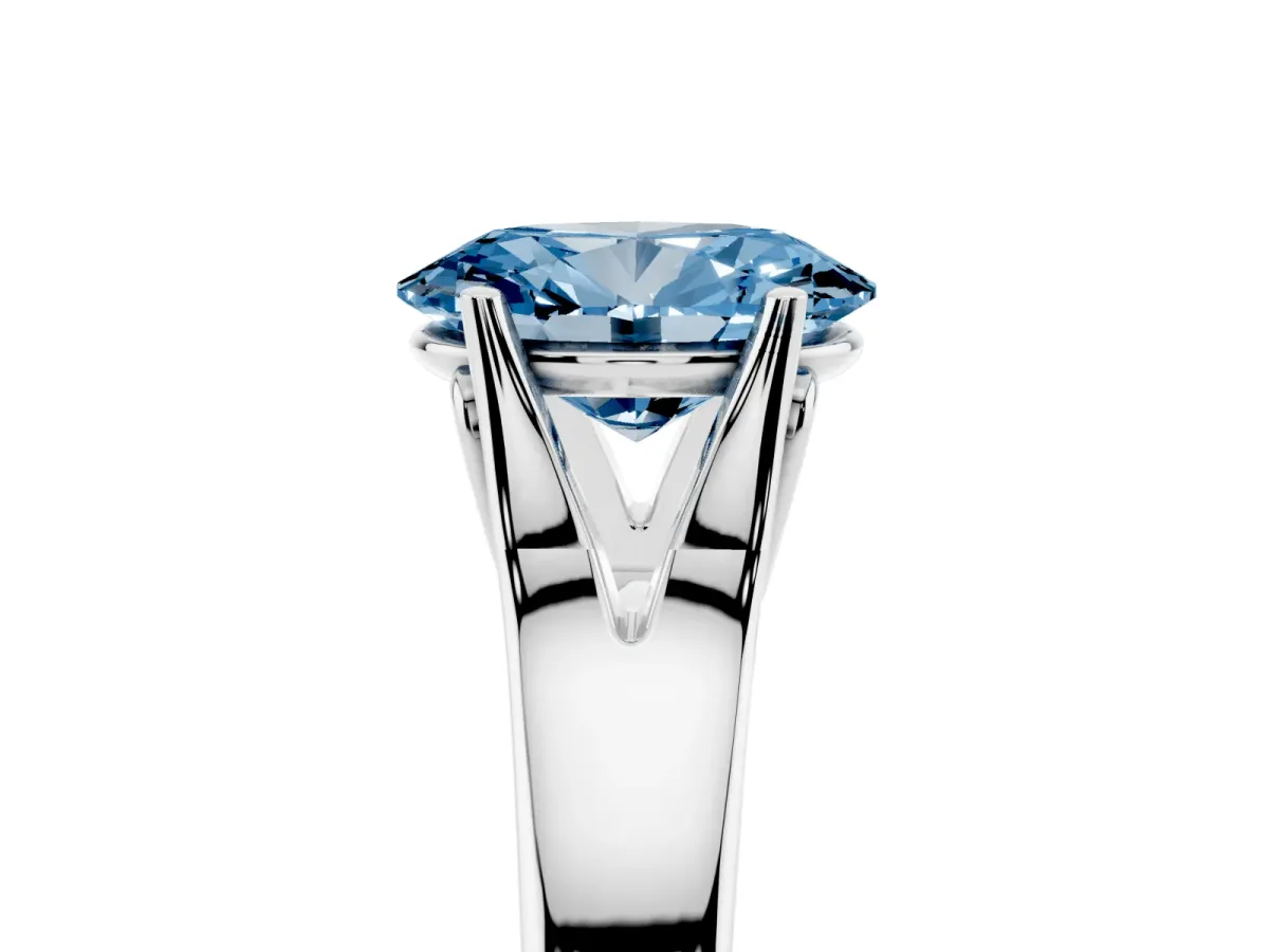 Fancy Blue Oval Cut Solitaire Diamond Ring with Cathedral Band and Four-Prong Setting Platinum