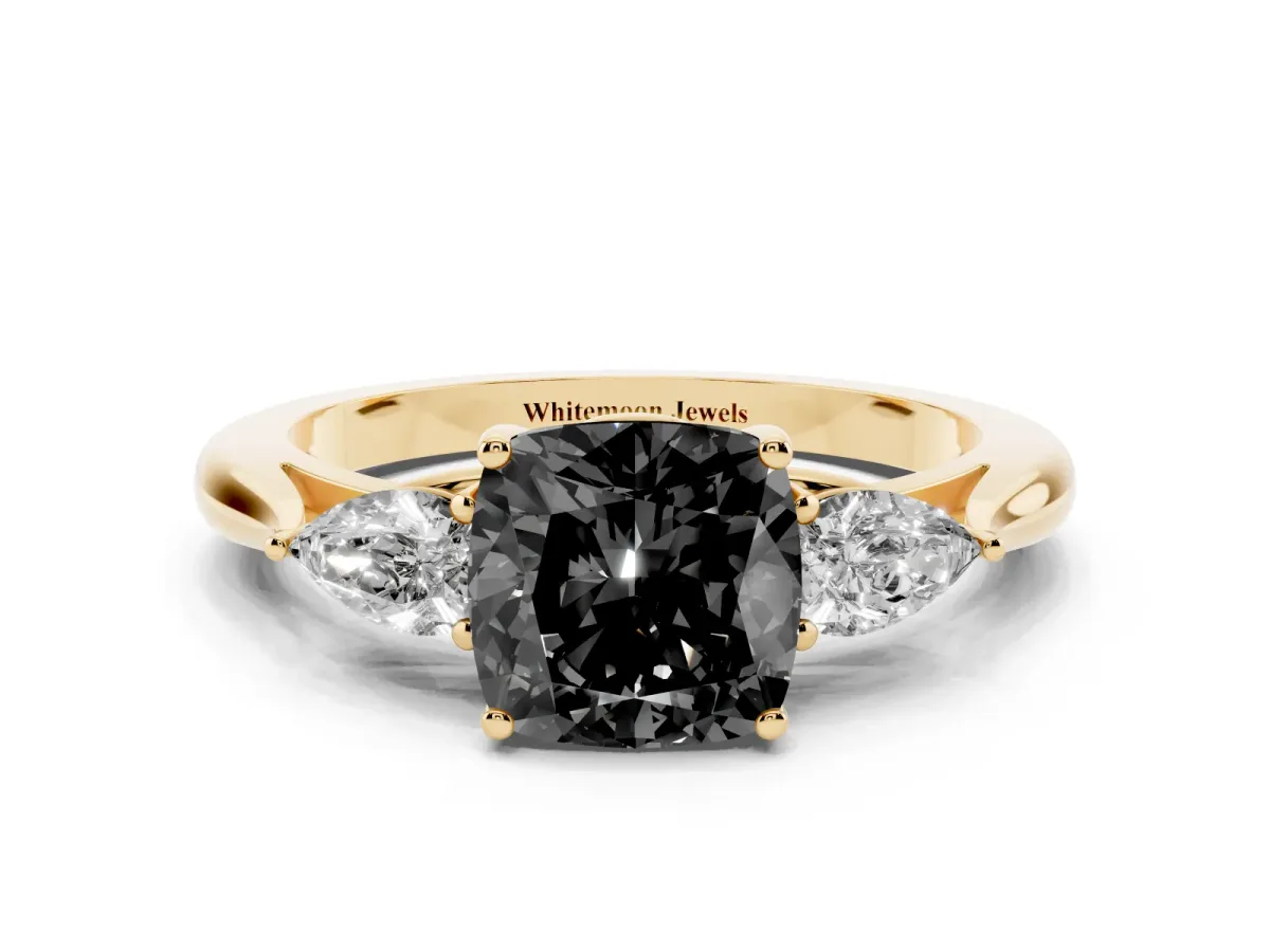 Fancy Black Cushion Cut Diamond Three-Stone Ring with Pear Side Stones and Prong Setting Yellow gold
