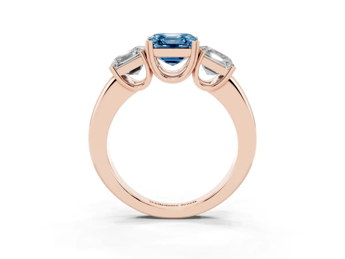 Fancy Blue Three-Stone Asscher Cut Cut Diamond Ring with Channel Set Band and Four-Prong Setting Rose gold