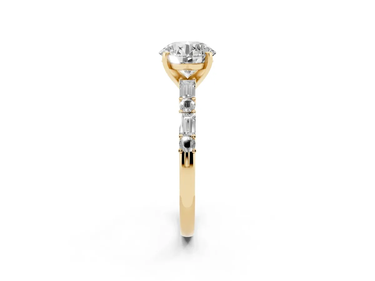 Round Cut Diamond Solitaire with Side Baguettes and Channel Set Band Yellow gold