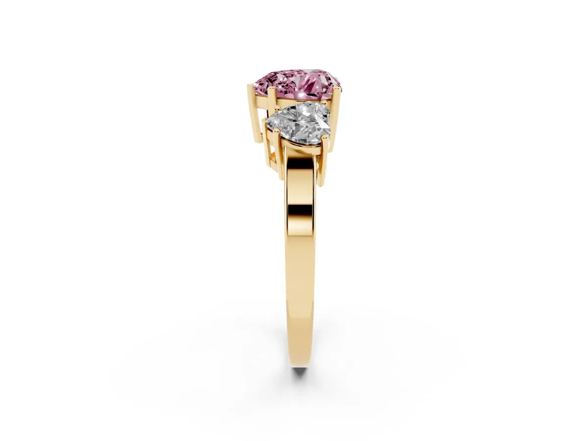 Fancy Pink Three-Stone Heart Cut Cut Diamond Engagement Ring with Flat Band and Four-Prong Setting Yellow gold