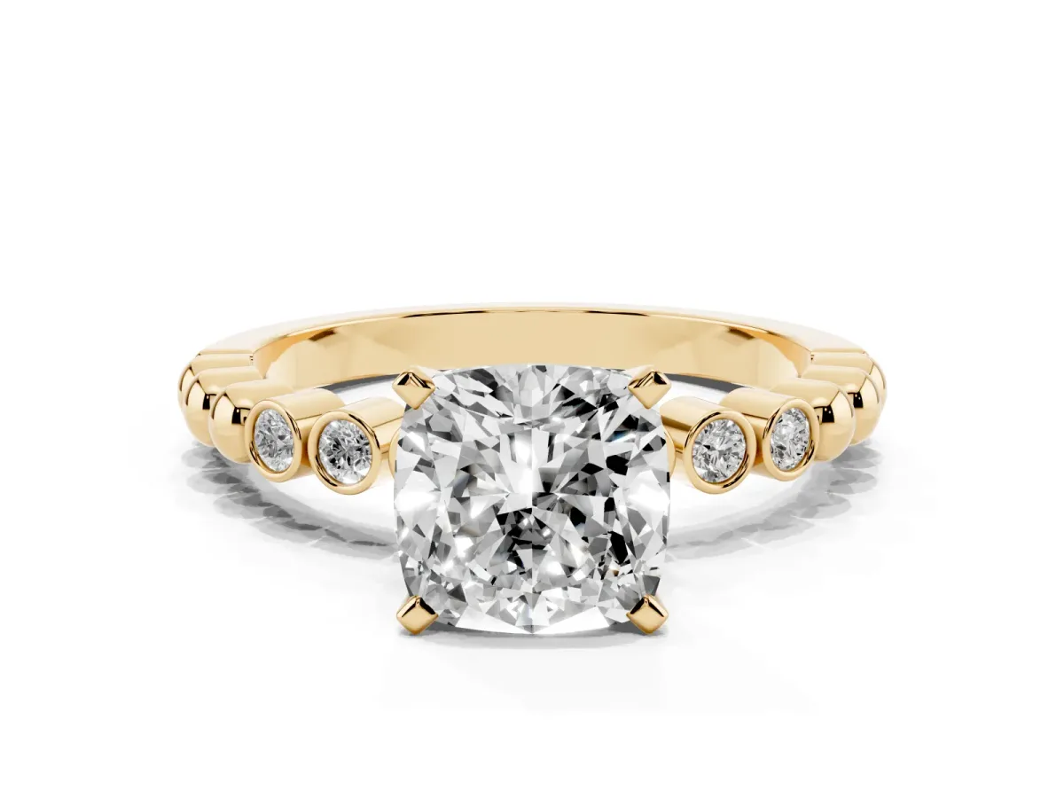 Cushion Cut Solitaire Bezel Accent Diamond Engagement Ring with Beaded Band and Four-Prong Setting Yellow gold