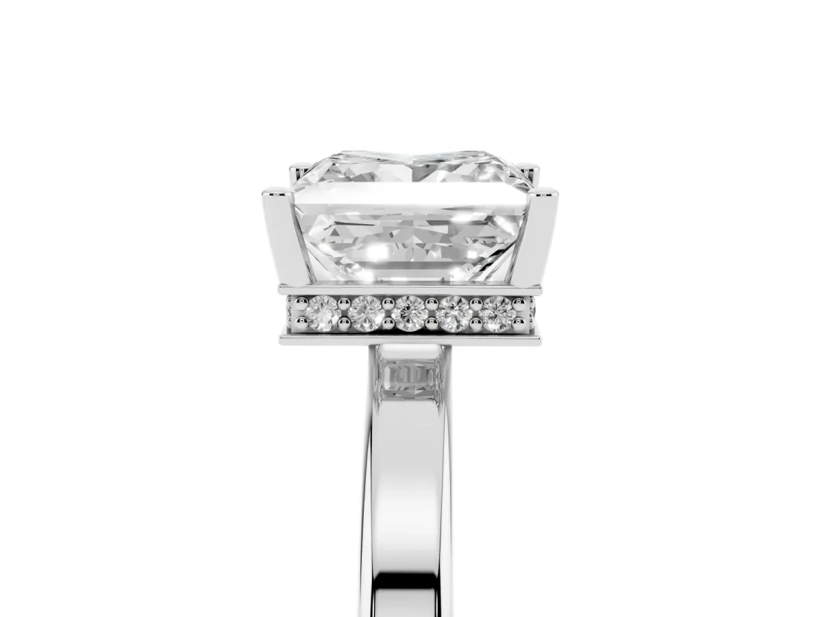 Princess Cut Cut Solitaire Engagement Ring with Four-Prong Setting on a Classic Band Silver
