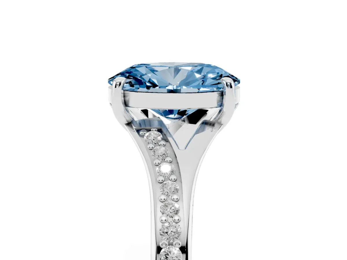 Fancy Blue Oval Cut Diamond Solitaire Ring with Pavé Band and Prong Setting Silver