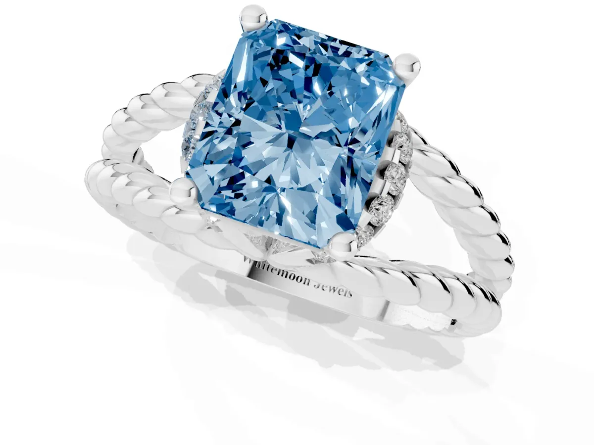 Fancy Blue Radiant Cut Halo Twisted Band Four-Prong Ring Silver