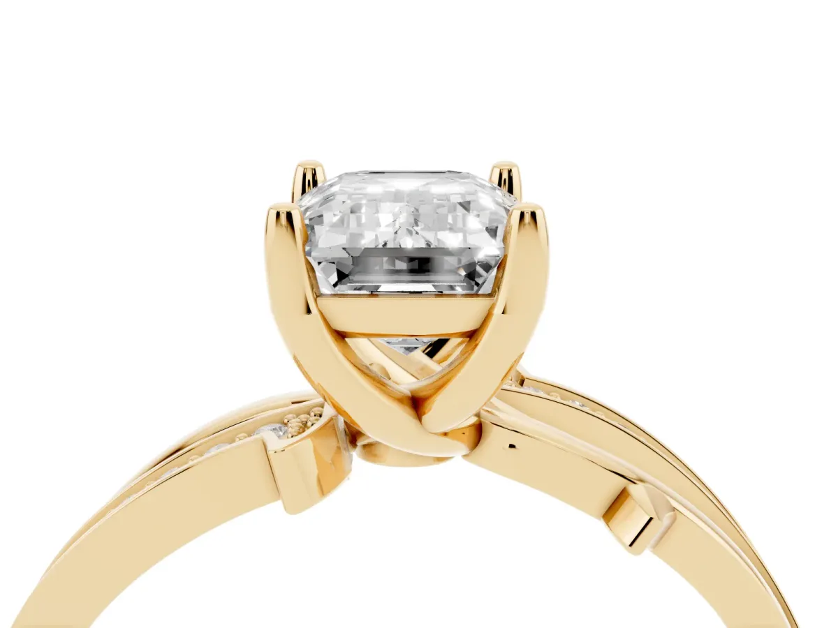 Emerald Cut Solitaire Twist Band with Pavé Accents and Four-Prong Setting Yellow gold
