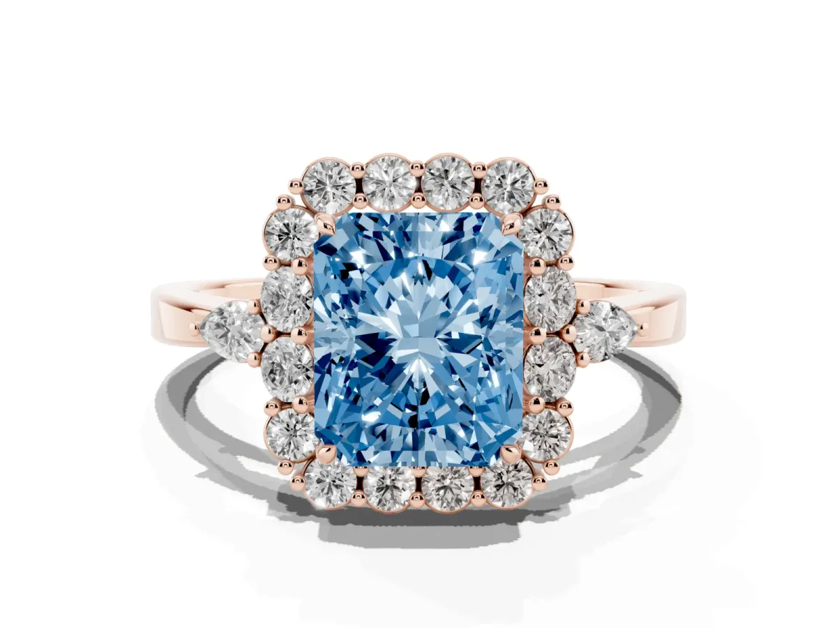 Fancy Blue Radiant Cut Diamond Halo Ring with Pear Side Stones and Prong Setting Rose gold