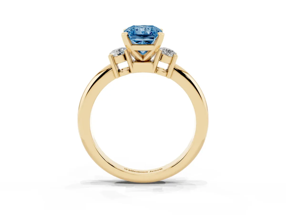 Fancy Blue Three-Stone Radiant Cut Cut Diamond Solitaire with Prong Setting and Classic Band Yellow gold
