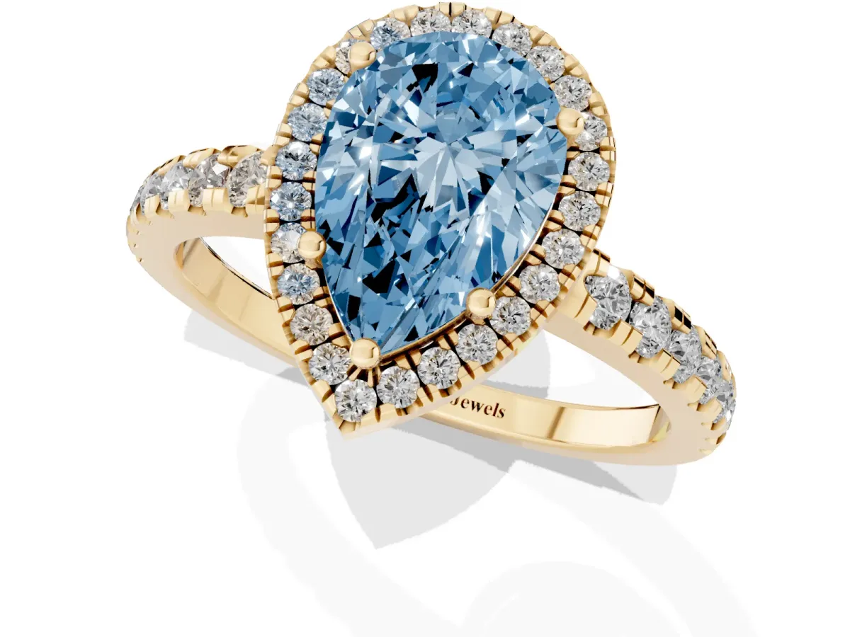 Fancy Blue Pear Cut Diamond Halo Ring with Pavé Band and Four-Prong Setting Yellow gold