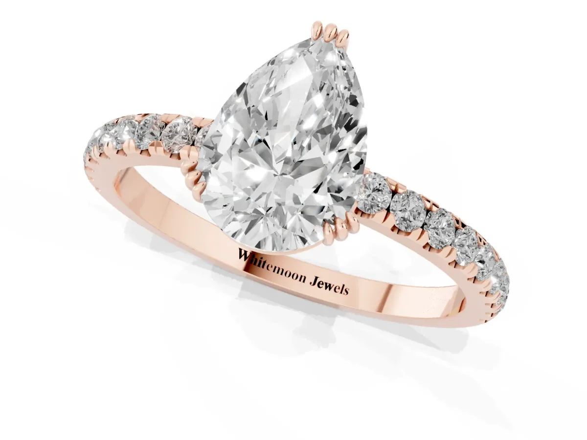 Pear Cut Brilliant Solitaire with Pavé Band and Claw Prong Setting Rose gold