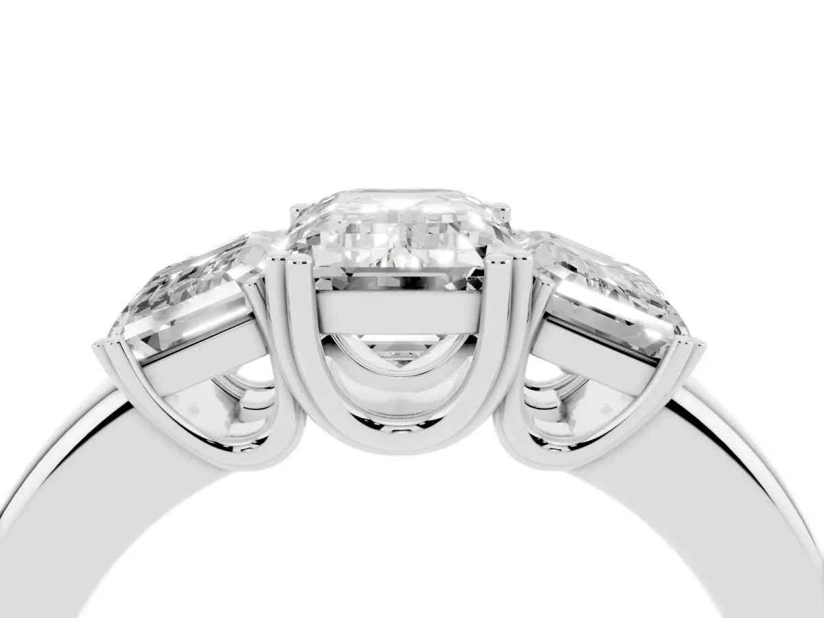 Three-Stone Emerald Cut Cut Diamond Ring with Channel Set Band and Four-Prong Setting Platinum