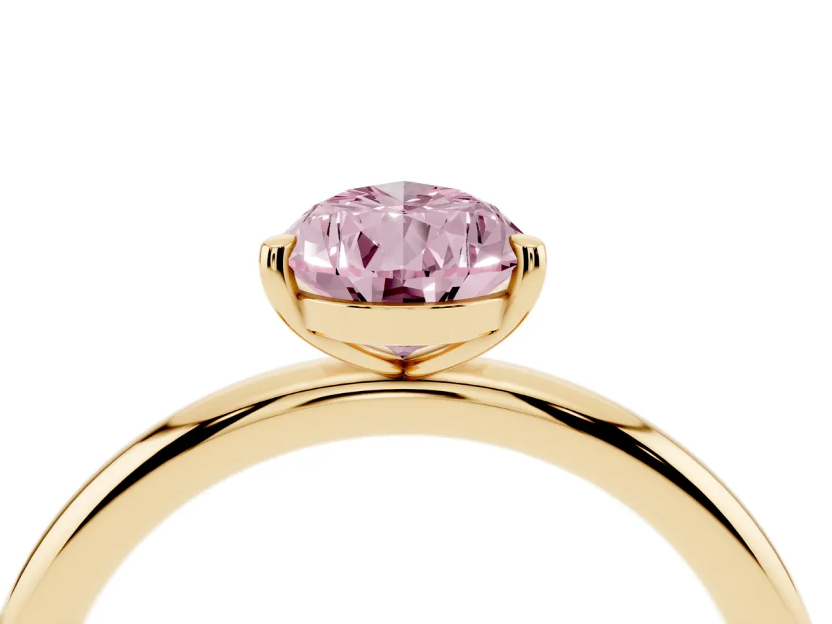 Fancy Pink Pear Cut Solitaire Diamond Ring with Four-Prong Setting on a Plain Band Yellow gold