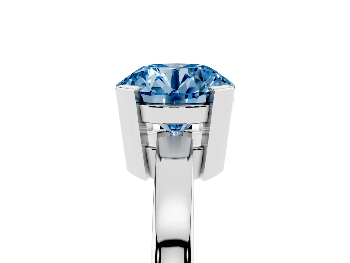 Fancy Blue Round Cut Cut Solitaire Ring with Four-Prong Setting and Classic Band Silver