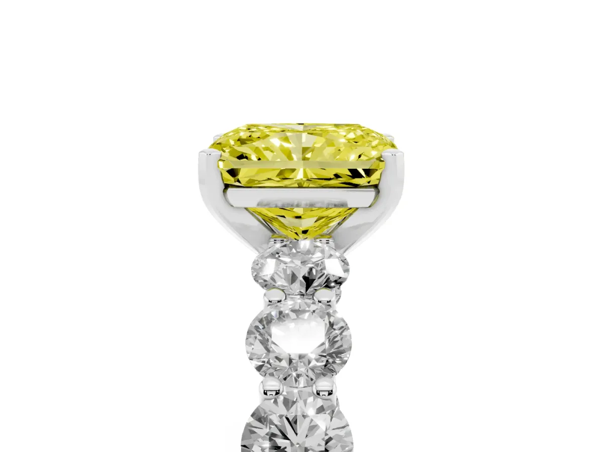 Fancy Yellow Radiant Cut Diamond Prong Setting with Side Stones on a Pave Band Silver