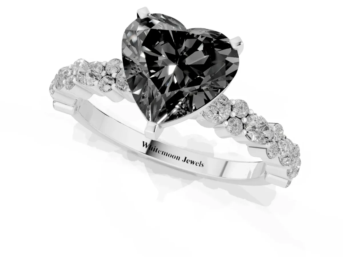 Fancy Black Heart Cut Diamond Side Stone Solitaire Ring with Round and Four-Prong Setting Platinum