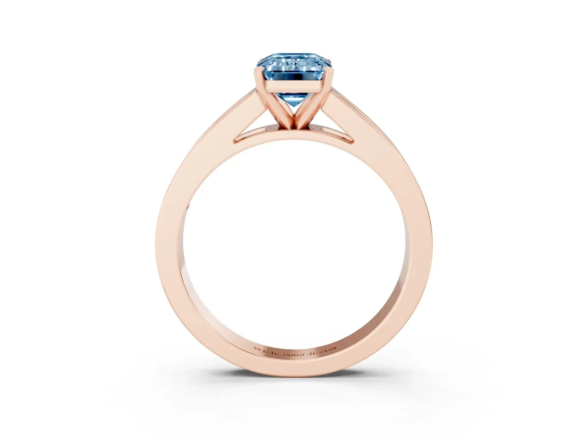 Fancy Blue Emerald Cut Solitaire Diamond Ring with Channel-Set Band and Four-Prong Setting Rose gold