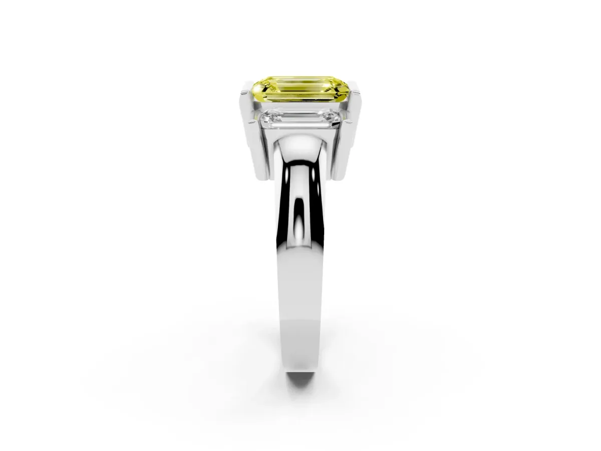Fancy Yellow Three Stone Emerald Cut Cut Channel Set Diamond Ring Platinum