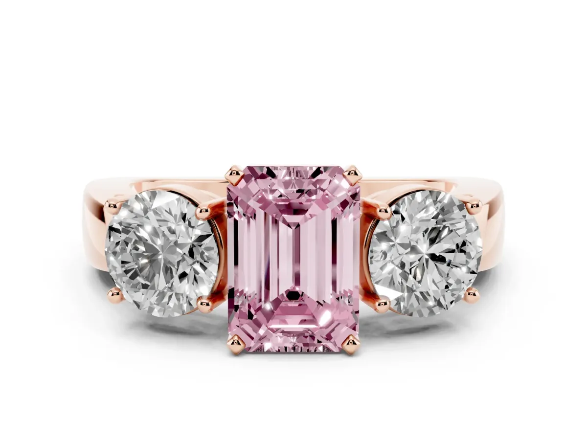 Fancy Pink Three-Stone Emerald Cut Diamond Ring with Round Side Stones, Classic Band, and Four-Prong Setting Rose gold