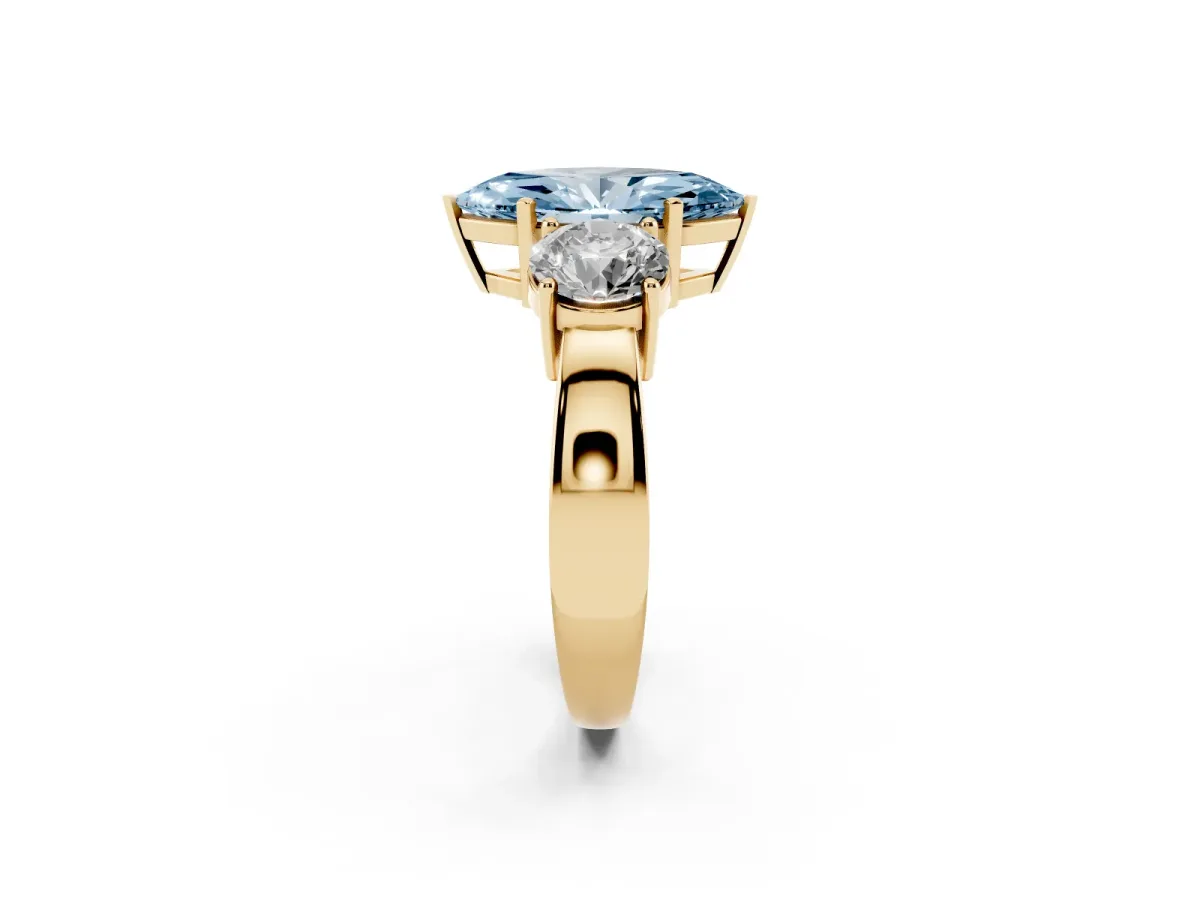 Fancy Blue Three-Stone Marquise Cut Diamond Ring with Round Side Stones, Classic Band, and Four-Prong Setting Yellow gold