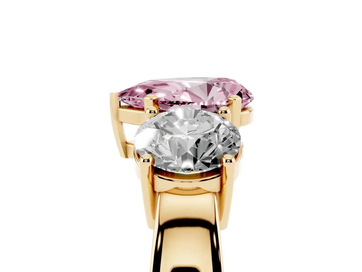 Fancy Pink Three-Stone Pear Cut Diamond Ring with Round Side Stones, Classic Band, and Four-Prong Setting Yellow gold