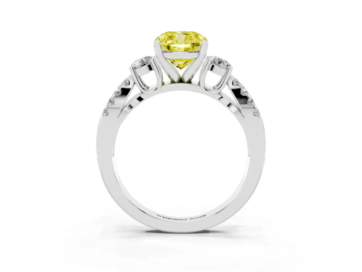 Fancy Yellow Cushion Cut Diamond Three-Stone Ring with Pavé Split Shank and Four-Prong Setting Platinum