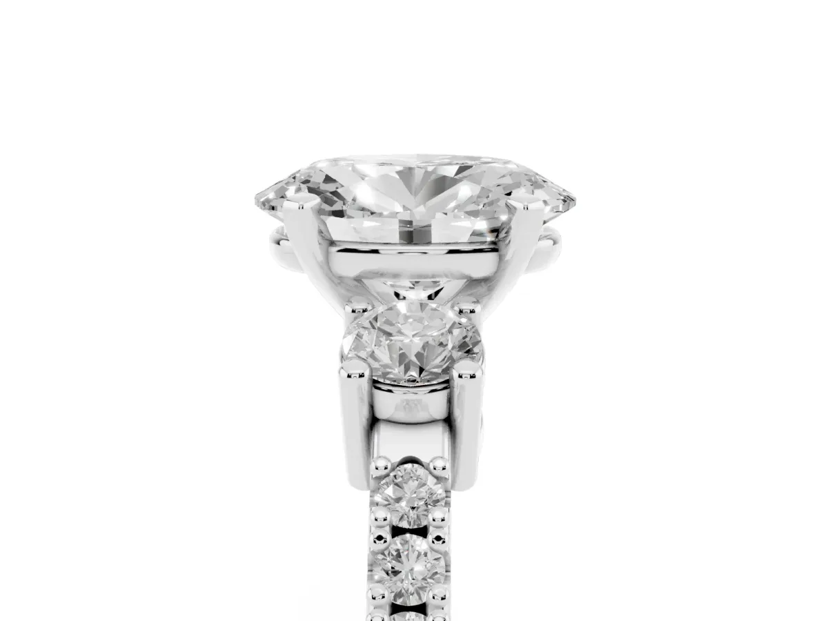 Oval Cut Three-Stone Diamond Pavé Band with Prong Setting Platinum