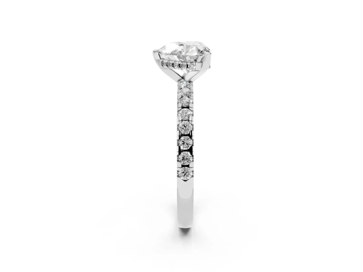 Heart Cut Diamond Solitaire Ring with Round Pavé Band and Four-Prong Setting Silver