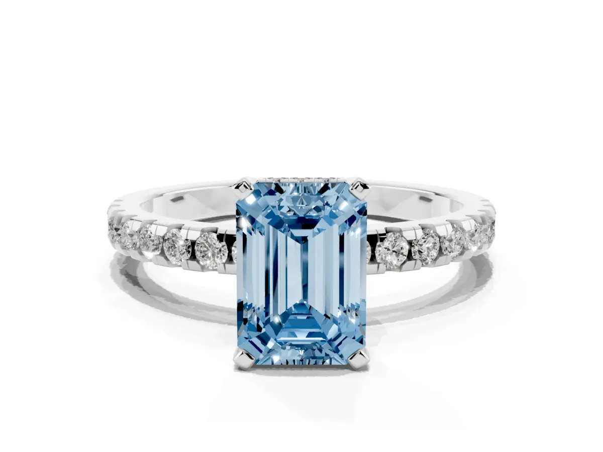 Fancy Blue Emerald Cut Diamond Solitaire Ring with Round Pavé Band and Four-Prong Setting Silver