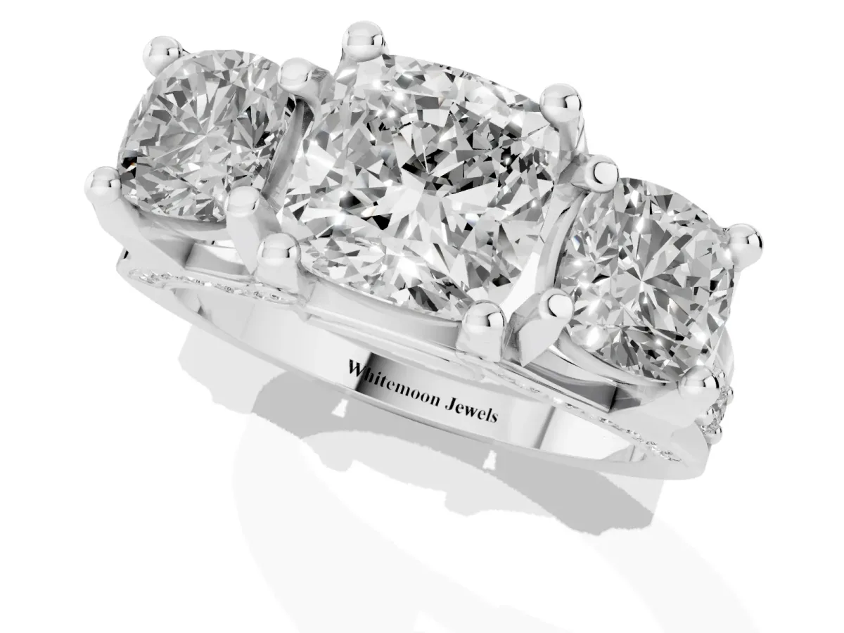 Cushion Cut Diamond Three-Stone Ring with Channel Set Band and Four-Prong Setting Silver