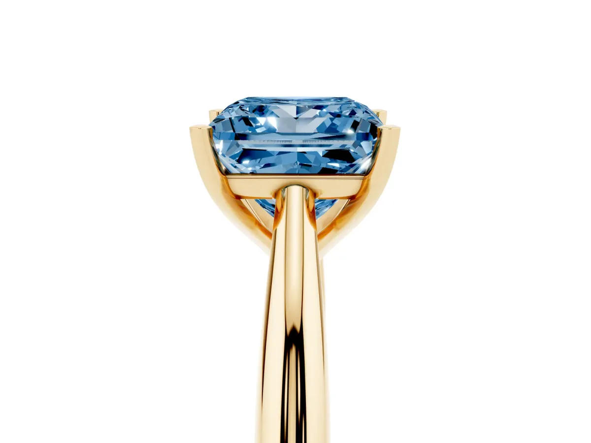 Fancy Blue Princess Cut Diamond Solitaire Engagement Ring with Cathedral Setting and Four-Prong Mount Yellow gold