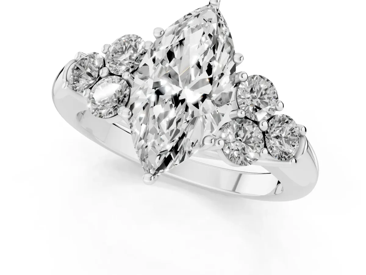 Marquise Cut Cut Diamond Cluster Ring with Round Accent Stones and Prong Setting on a Classic Band Silver