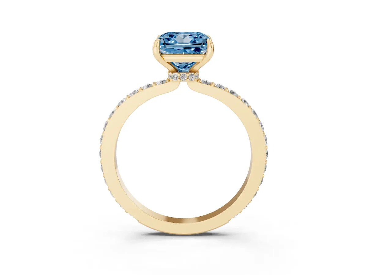 Fancy Blue Princess Cut Diamond Solitaire Engagement Ring with Pavé Band and Four-Prong Setting Yellow gold