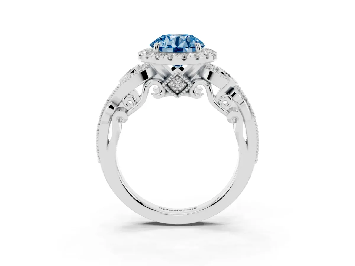 Fancy Blue Round Cut Diamond Halo Ring with Milgrain Pavé Band and Four-Prong Setting Platinum