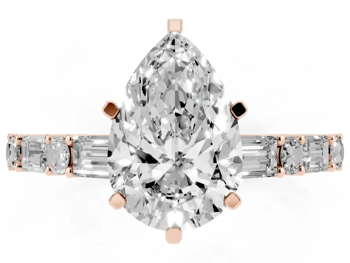 Pear Cut Diamond Solitaire with Side Baguettes and Channel Set Band Rose gold