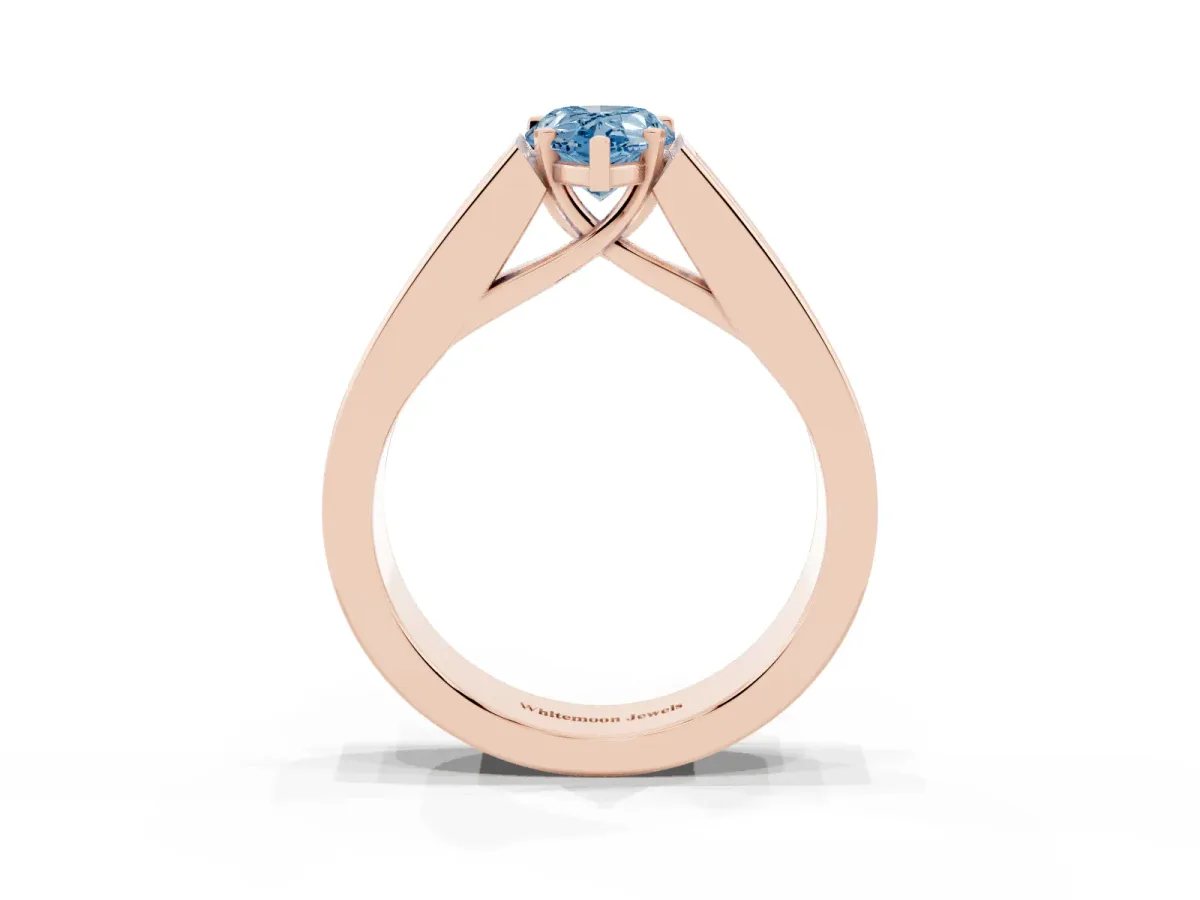 Fancy Blue Pear Cut Cut Channel Set Solitaire Ring with Four-Prong Setting Rose gold