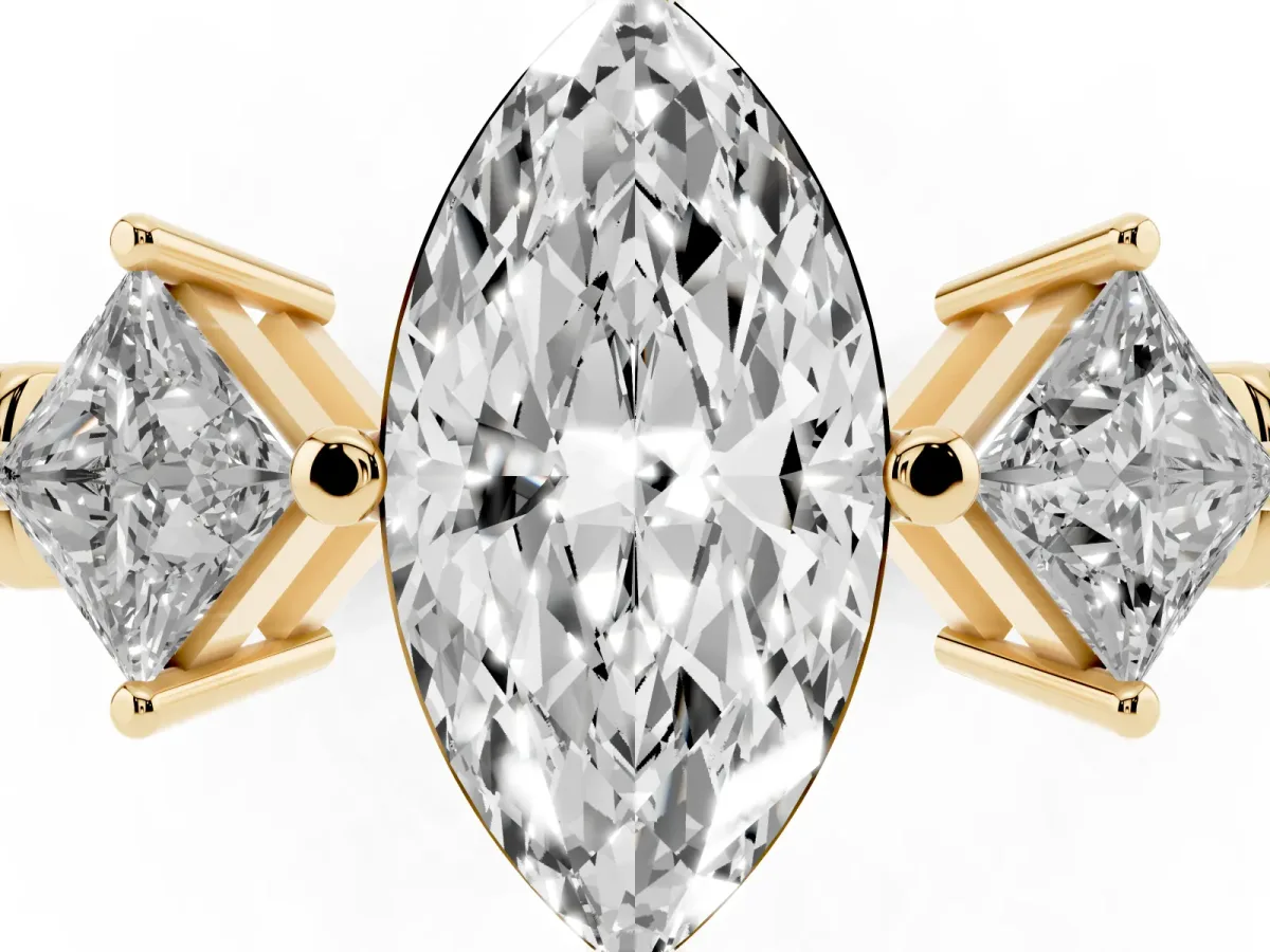 Three-Stone Marquise Cut and Princess Cut Diamond Ring with Channel Band and Four-Prong Setting Yellow gold