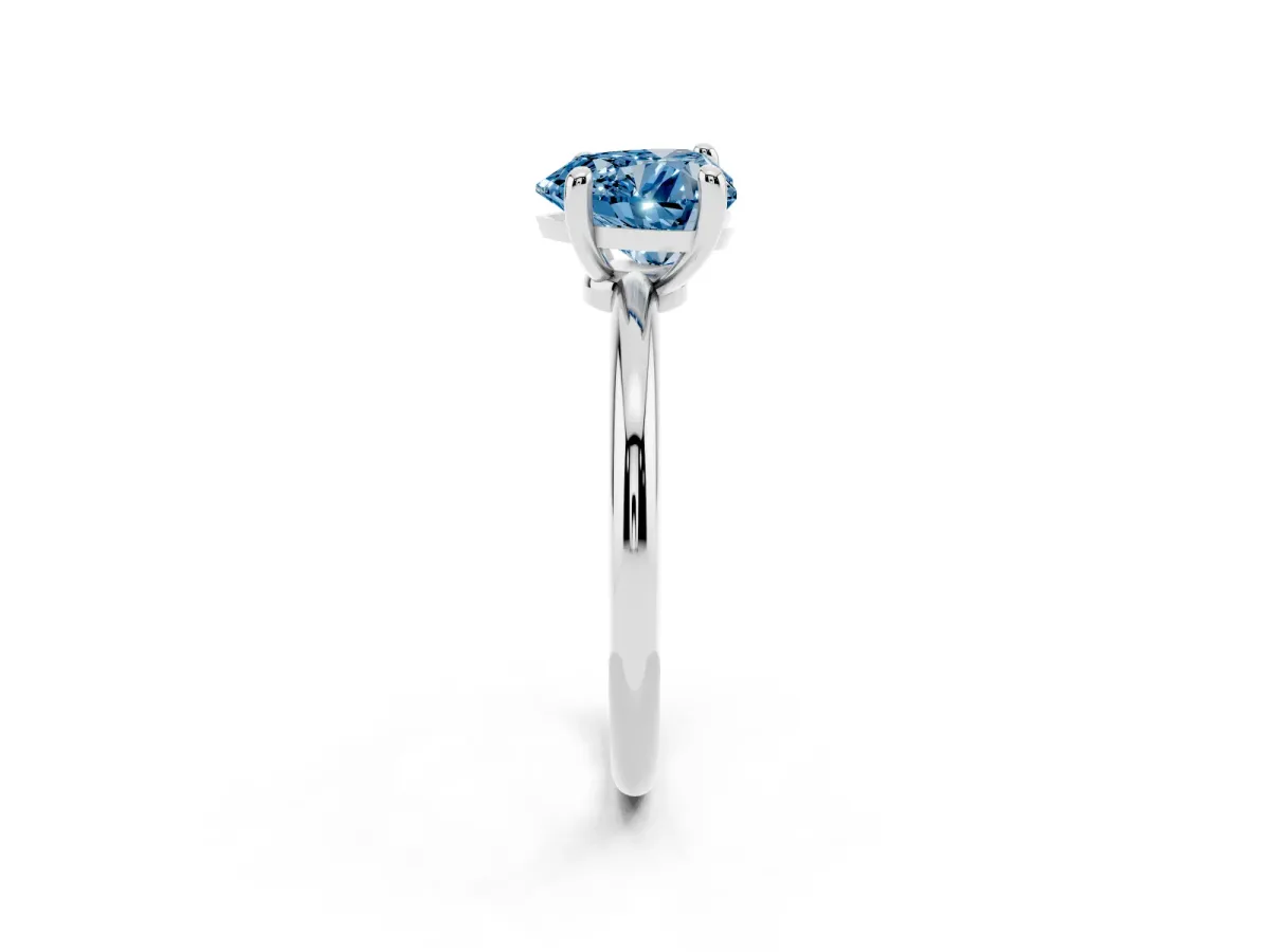 Fancy Blue Heart Cut Solitaire Diamond Ring with 4-Prong Setting on a Classic Band Silver
