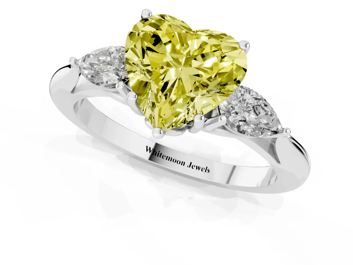 Fancy Yellow Three-Stone Heart Cut Diamond Ring with Pear Side Stones in Four-Prong Setting Silver