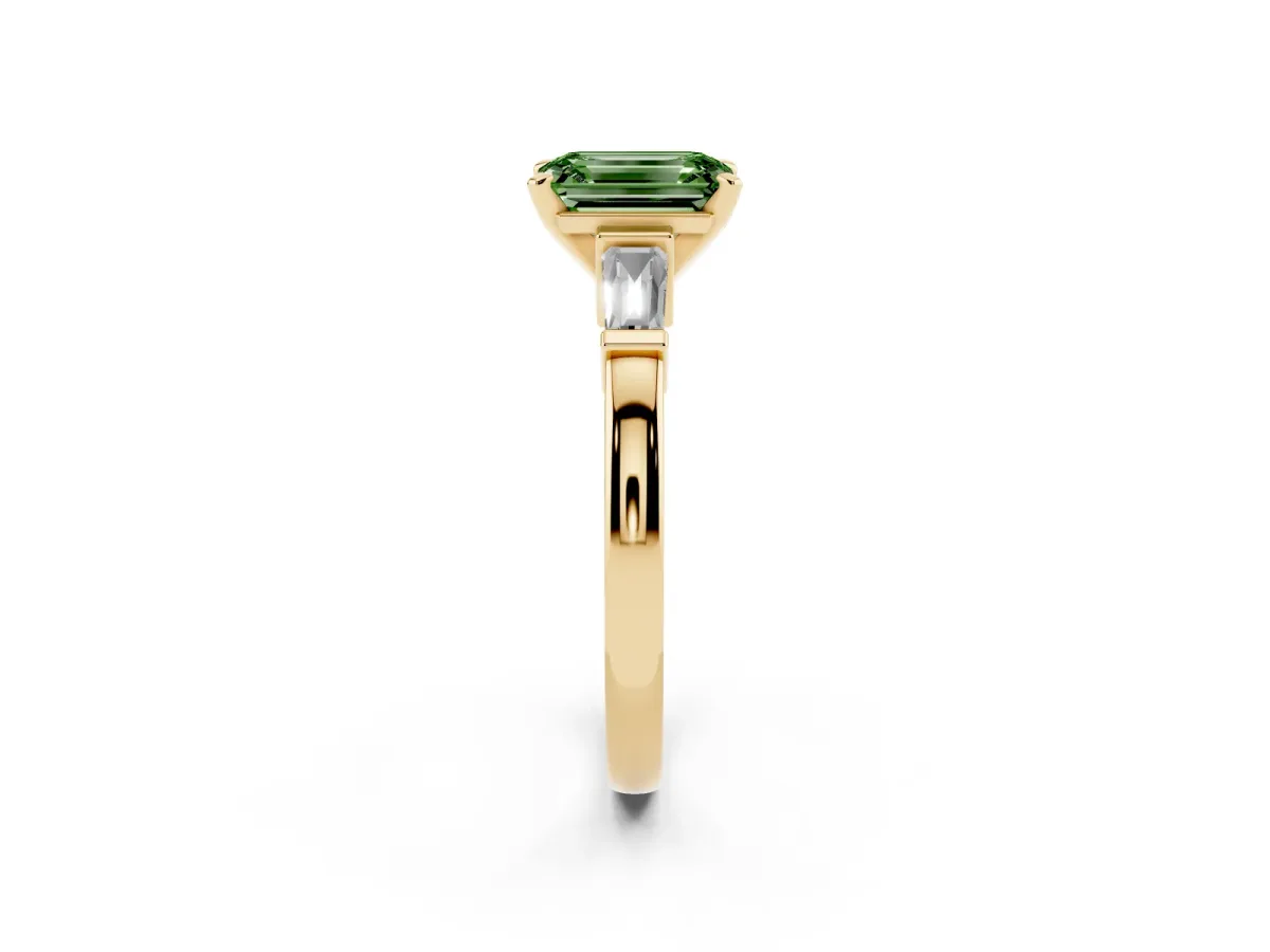 Fancy Green Emerald Cut Cut Diamond Solitaire Ring with Tapered Baguette Accents and Four-Prong Setting Yellow gold