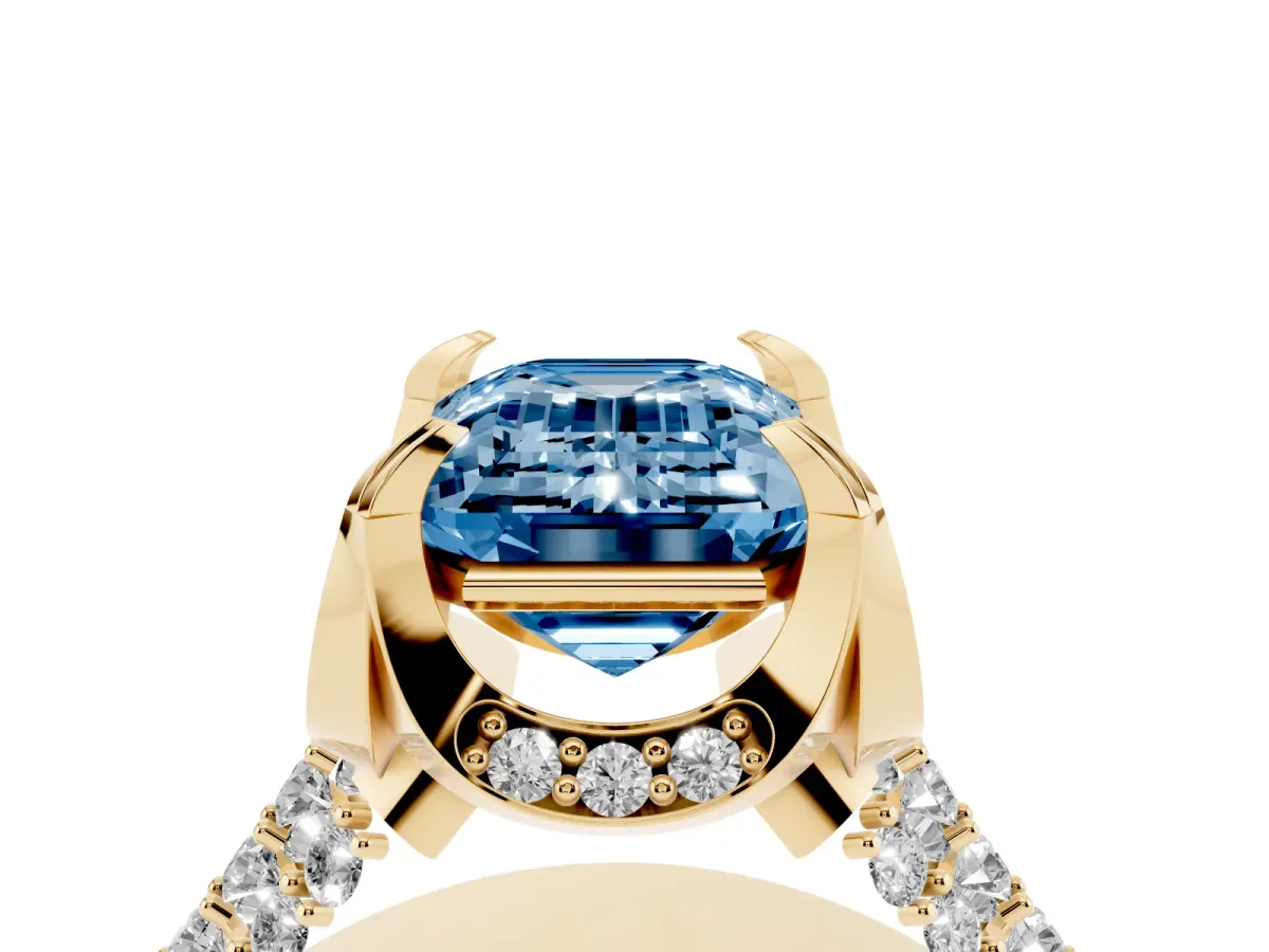 Fancy Blue Emerald Cut Solitaire Pave Split Shank Ring with Four-Prong Setting Yellow gold