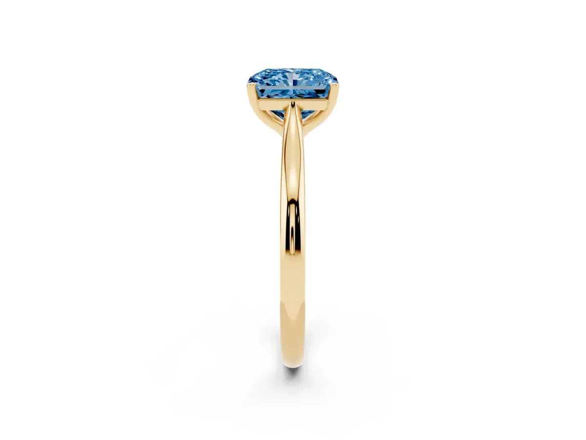 Fancy Blue Radiant Cut Cut Solitaire Ring with Cathedral Band and Four-Prong Setting Yellow gold