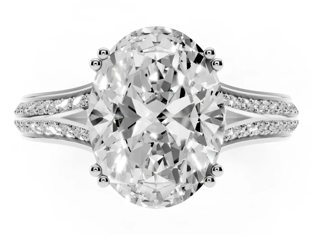 Oval Cut Diamond Split Shank Engagement Ring with Pavé Band White gold