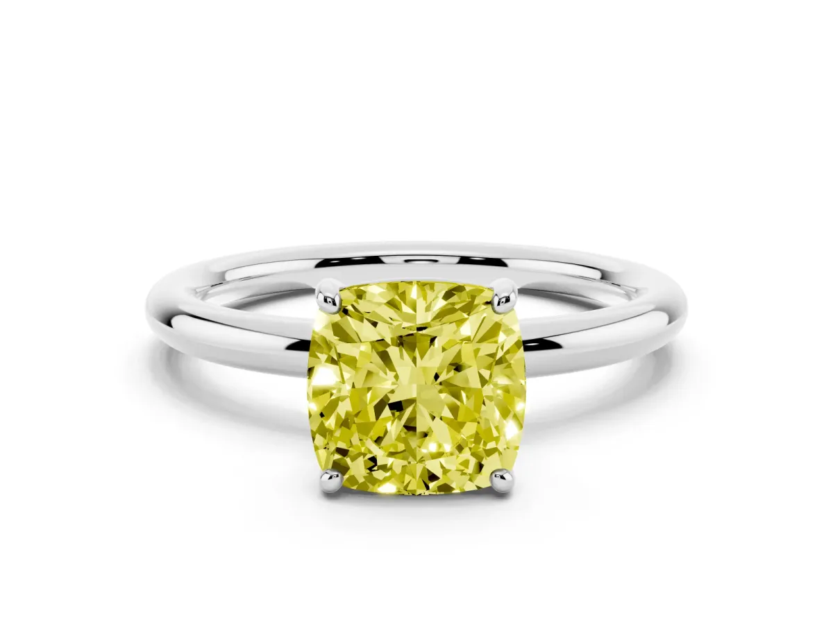 Fancy Yellow Cushion Cut Solitaire Diamond Ring with Four-Prong Setting on a Plain Band Silver