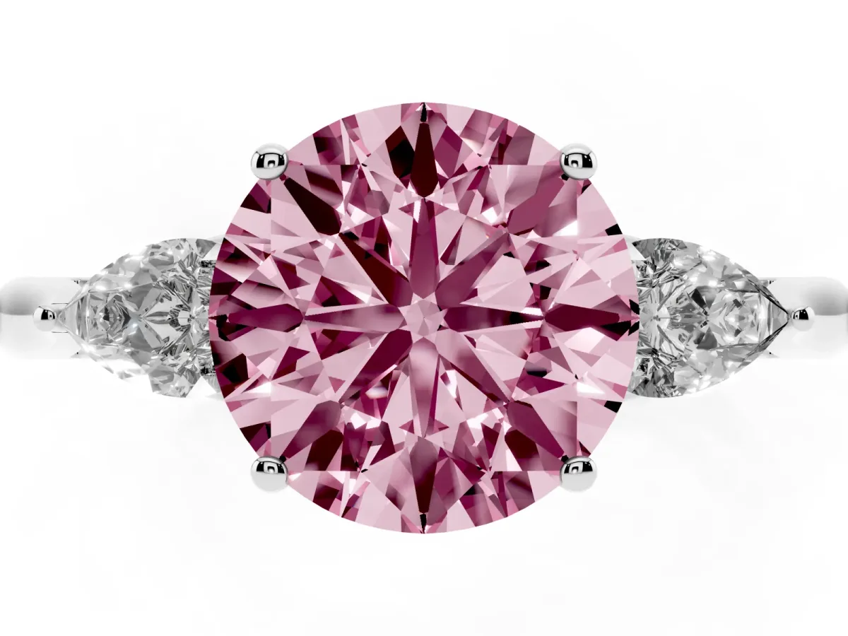Fancy Pink Three-Stone Round Cut Brilliant Diamond Solitaire Ring with Tapered Band and Four-Prong Setting Silver