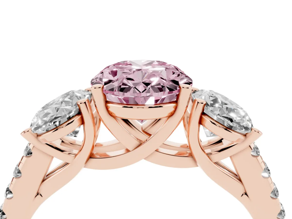 Fancy Pink Three-Stone Oval Cut Diamond Ring with Round Pavé Band and Prong Setting Rose gold