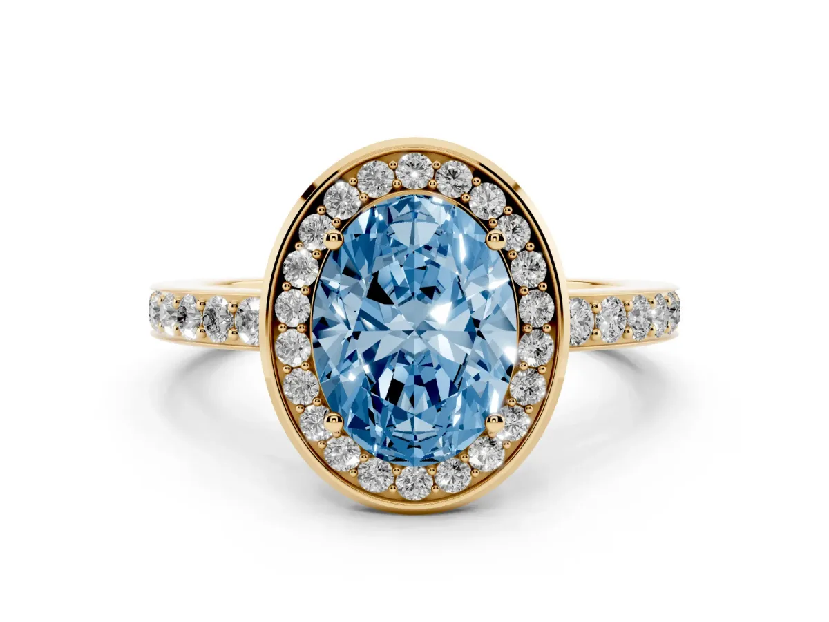 Fancy Blue Oval Cut Diamond Halo Ring with Bezel Frame and Pavé Band Yellow gold
