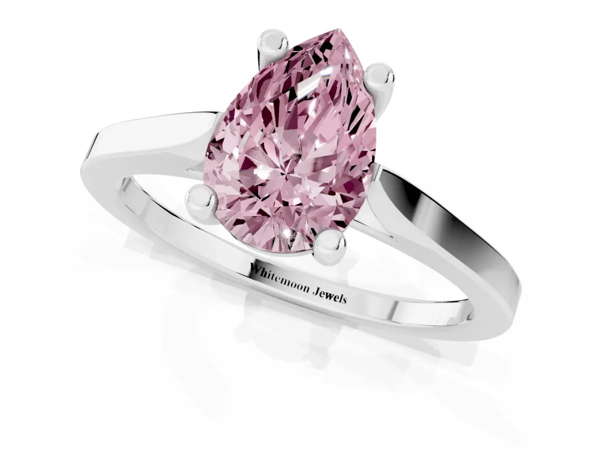 Fancy Pink Pear Cut Solitaire Diamond Ring with Four-Prong Setting and Tapered Band Platinum